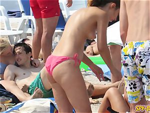 scorching humungous melons sans bra inexperienced teenagers bikini Beach spycam