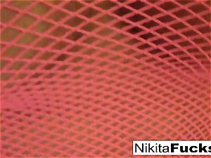 Solo fishnet solo with red-hot milf Nikita Von James